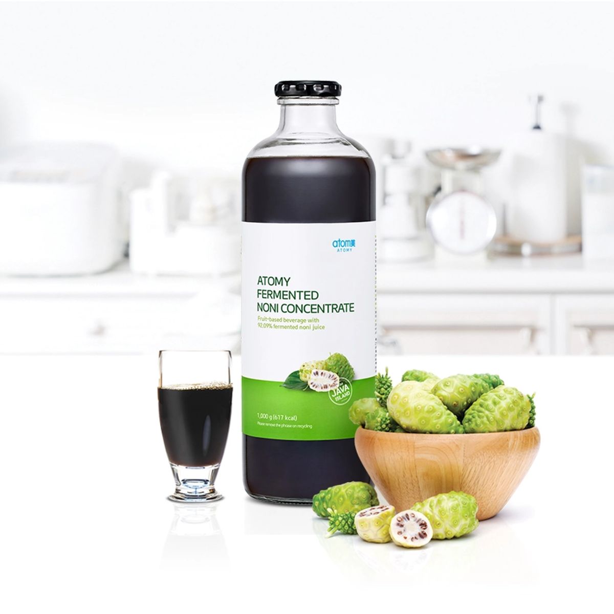 Atomy Noni Bottle mit Produktverpackung